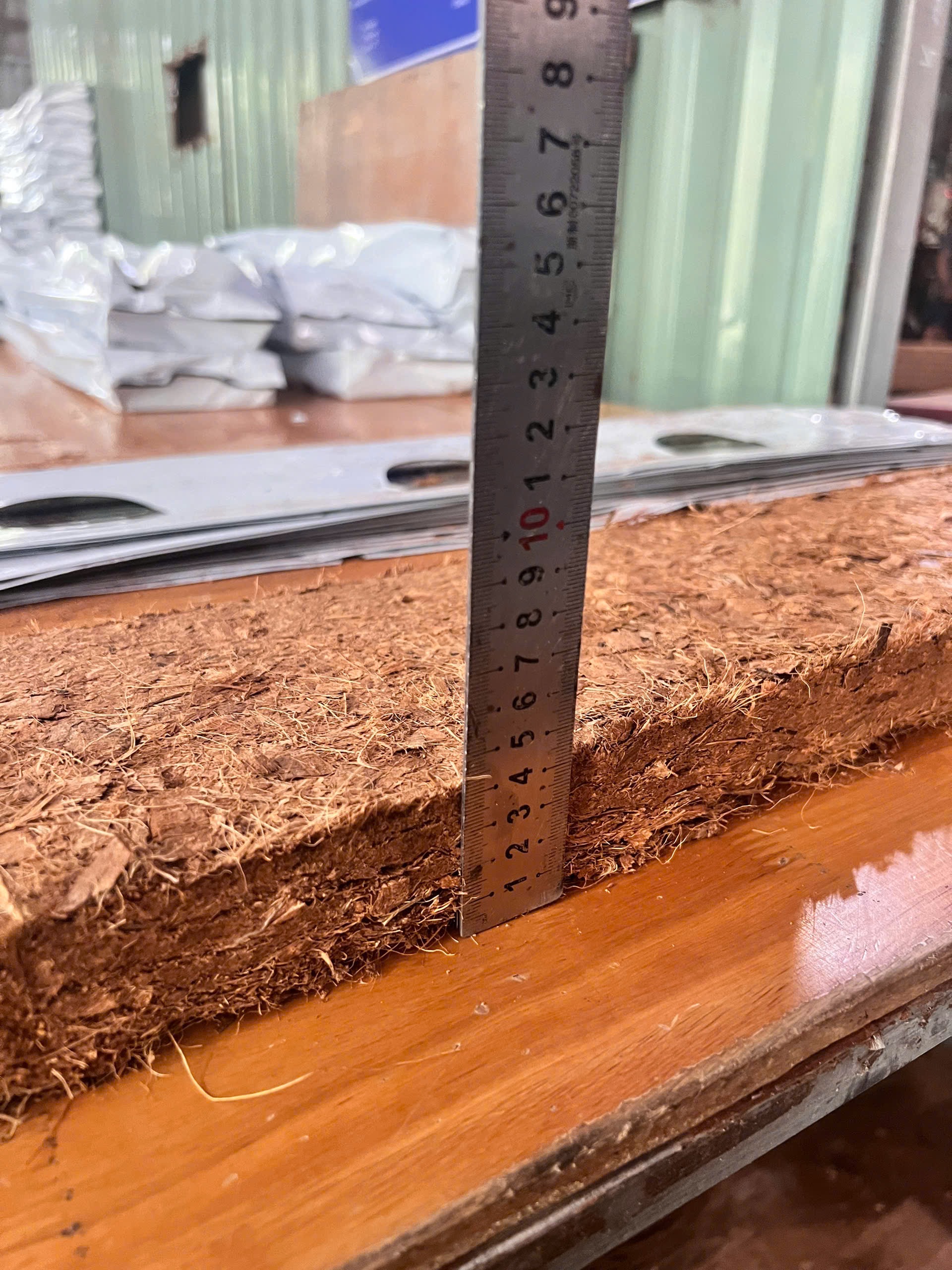 VinaTap automated hydraulic compression and bagging line for greenhouse coco slabs in Vietnam